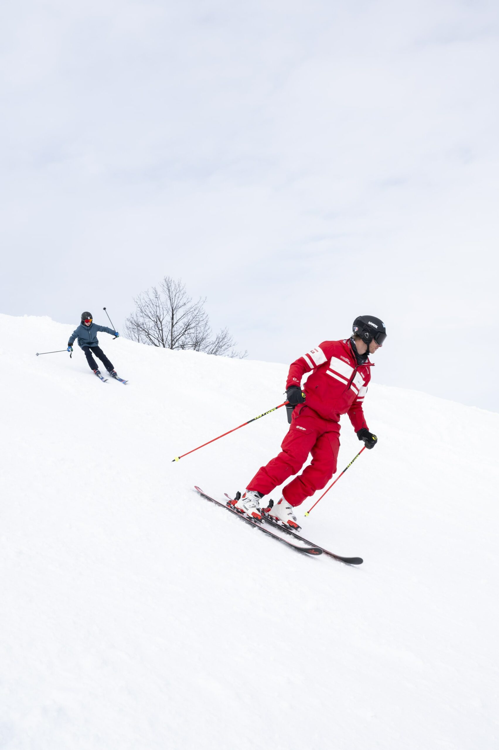 moniteur est et élève descente piste espace diamant hiver